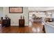 Inviting open-concept showcasing a modern kitchen with stainless steel appliances and hardwood floors at 267 Westbrook Ct, Columbus, IN 47201