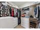 Well-organized walk-in closet with custom shelving and ample storage space for clothes and accessories at 267 Westbrook Ct, Columbus, IN 47201