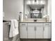 Bathroom vanity with granite countertops, white cabinets, modern lighting, and a large mirror at 2779 Ruffian Dr, Westfield, IN 46074