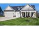 Inviting single-Gathering home with manicured lawn, three car garage, and covered entryway at 2779 Ruffian Dr, Westfield, IN 46074