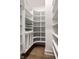 Walk-in pantry with custom white shelving at 2779 Ruffian Dr, Westfield, IN 46074