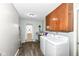 Functional laundry room with washer, dryer, and convenient storage space at 3607 Windsor Way, Anderson, IN 46011