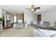 Spacious living room with two ceiling fans, a comfortable recliner, and stylish decor at 3607 Windsor Way, Anderson, IN 46011