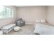 Bedroom with a large window offering lots of natural light and neutral paint at 3728 Dunellen Cir, Carmel, IN 46074