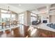 Open concept living space with dining area, fireplace, and coffered ceilings at 3728 Dunellen Cir, Carmel, IN 46074