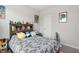 bedroom featuring a bed with dinosaur-themed bedding, posters, and a custom headboard at 3971 Albert Ln, Bargersville, IN 46106