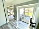 Entryway with sliding glass doors that open onto a wooden deck with a bench at 4029 W Fairview Rd, Greenwood, IN 46142