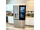 The stainless steel refrigerator is the focal point of this modern kitchen at 4029 W Fairview Rd, Greenwood, IN 46142