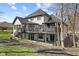 Backyard featuring a large deck with gazebo, ideal for outdoor entertaining at 4312 S Woodbridge Ln, New Palestine, IN 46163