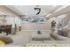 Finished basement with bar, recessed lights, and a large sectional sofa at 4312 S Woodbridge Ln, New Palestine, IN 46163