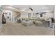 Expansive basement featuring cozy seating, stairs, and recessed lighting at 4312 S Woodbridge Ln, New Palestine, IN 46163