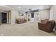 Comfortable basement area with leather furniture, TV, and neutral decor at 4312 S Woodbridge Ln, New Palestine, IN 46163