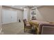 Basement game area with a card table and storage area with double doors at 4312 S Woodbridge Ln, New Palestine, IN 46163