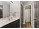 Cozy bathroom features a vanity with modern fixtures and a view of the toilet at 4312 S Woodbridge Ln, New Palestine, IN 46163