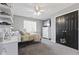 Bedroom featuring a ceiling fan, carpet flooring, and a modern dresser at 4312 S Woodbridge Ln, New Palestine, IN 46163