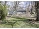 Shaded backyard with a storage shed and mature trees at 4342 Lasalle St, Indianapolis, IN 46205