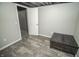 Finished basement space featuring laminate flooring and neutral paint at 4342 Lasalle St, Indianapolis, IN 46205