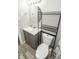 Bathroom featuring a vanity, round mirror, open storage and toilet, all with modern fixtures at 4342 Lasalle St, Indianapolis, IN 46205