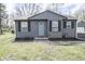 Charming home with a light blue front door and black shutters creating a welcoming curb appeal at 4342 Lasalle St, Indianapolis, IN 46205