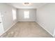 Neutral living room with carpet offers a blank canvas for personalization and comfortable living at 4342 Lasalle St, Indianapolis, IN 46205