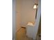 Powder room with tile floor, sink, vanity, and modern lighting at 4431 Bertrand Rd, Indianapolis, IN 46222