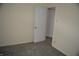 Bedroom with fresh paint, new carpet, and a door leading to another room at 4431 Bertrand Rd, Indianapolis, IN 46222