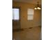 Dining room with a window with blinds, hanging light fixture, and a door with a curtain at 4431 Bertrand Rd, Indianapolis, IN 46222