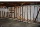 A photo inside the detached garage shows exposed framing and a concrete floor at 4431 Bertrand Rd, Indianapolis, IN 46222
