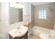 Bathroom featuring modern tiling, sink and a shower and tub at 4742 Primrose Ave, Indianapolis, IN 46205
