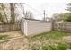 Detached garage with siding in a fenced backyard at 4742 Primrose Ave, Indianapolis, IN 46205