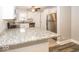 Modern kitchen featuring granite countertops and stainless-steel appliances at 4742 Primrose Ave, Indianapolis, IN 46205