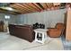 Unfinished basement featuring concrete walls, exposed ceiling, and ample open space for future customization at 5145 Greenheart Pl, Indianapolis, IN 46237