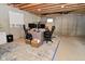 Unfinished basement showcasing concrete walls, a drop ceiling, and open space perfect for customization at 5145 Greenheart Pl, Indianapolis, IN 46237