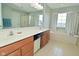Bathroom featuring double vanity, soaking tub, and combination shower at 5145 Greenheart Pl, Indianapolis, IN 46237