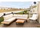 Inviting back deck featuring comfortable patio furniture and scenic views of the water at 5301 Tanglewood Ln, Whitestown, IN 46075
