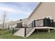 Back deck and grassy yard, ideal for outdoor relaxation and enjoying nature at 5301 Tanglewood Ln, Whitestown, IN 46075