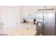 Kitchen featuring stainless steel appliances, a refrigerator, and ample cabinet space at 5301 Tanglewood Ln, Whitestown, IN 46075