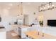Bright kitchen with stainless appliances, island with sink, and open layout to the dining and living areas at 5301 Tanglewood Ln, Whitestown, IN 46075