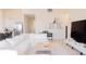 Open concept living space featuring a kitchen, a living room with a large white sofa, and piano at 5301 Tanglewood Ln, Whitestown, IN 46075