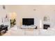 Cozy living room showcasing a fireplace, modern decor, and plenty of space for relaxation and entertainment at 5301 Tanglewood Ln, Whitestown, IN 46075