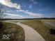 Explore the community's scenic walking path with a beautiful pond view. Enjoy the great outdoors! at 6017 Card Blvd, Indianapolis, IN 46221