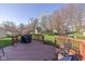 Enjoy the backyard from the deck, perfect for outdoor dining at 6018 Maple Forge Cir, Indianapolis, IN 46254