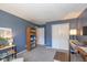 Bedroom with bookcase, closet, and desk with computer monitors at 6018 Maple Forge Cir, Indianapolis, IN 46254