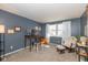 Bedroom with desk, glider chair and plenty of natural light at 6018 Maple Forge Cir, Indianapolis, IN 46254