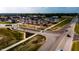 New home community with colorful homes, green space, and easy access to local roads at 6229 Hampton Walk Blvd, McCordsville, IN 46055