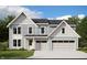 Charming two-story home featuring blue siding, white trim, and a welcoming two-car garage at 6229 Hampton Walk Blvd, McCordsville, IN 46055
