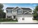 Charming two-story home with gray siding, white trim, a three car garage and inviting front porch at 7118 Sterling Way, Brownsburg, IN 46112