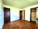 Bedroom with hardwood floors, closet, and natural light at 7132 N Stafford Ln, Martinsville, IN 46151