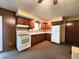 Functional kitchen with ample cabinet space, white appliances, and room for customization at 7132 N Stafford Ln, Martinsville, IN 46151