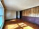 Hardwood floors, exposed brick, and large windows brighten this living space at 7132 N Stafford Ln, Martinsville, IN 46151